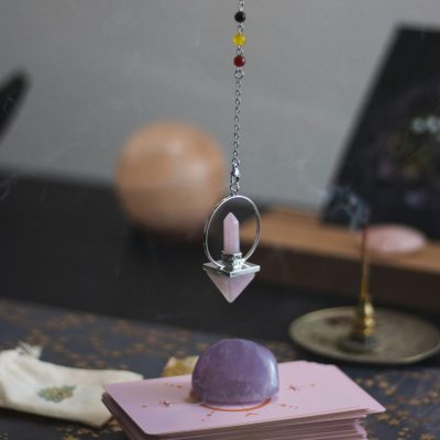 Amethyst pendulum with tarot cards